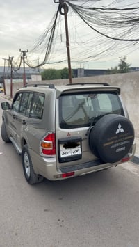 لبيع او مراوس باجيرو 2002  رقم اربيل مميز  سياره مكينه وكير فيفتي طك ك...