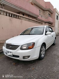 كيا سبكترا 2009 امريكي  صبغ قطعتين بدون داخل جاملغ خلفي ونص صندوق  محر...