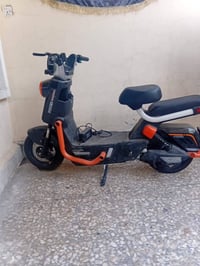 دراجه شحن  موديل 2025 نوعيه بور السعر 200 بطاريات ضعيفه الرقم 07728899...