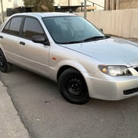 مازدا 323 • ٢٠٠٤ • صبغ عام