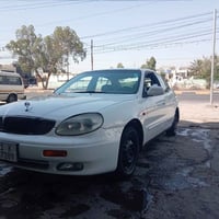 دايو لكنزه موديل ٢٠٠٠ صدر مامي خلفي جديد تخم تاير جديد غرفه جديده شاده...