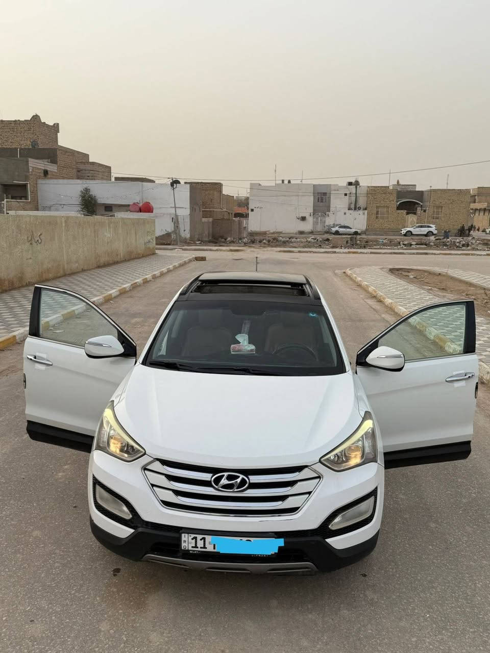 السلام عليكم سنتافي٢٠١٣ شكل ١٥ كويتي رقم بغداد بسمي فول مواصفات ١/١   ٦ سلندر ٧ راكب فور ويل بنراما التشغيل بصمة كذلك الابواب مري شفط انارة عند القتراب بردات خلفية ٣ قطع تبريد السيارة مالت جناي متعوب عليه واحلى من الصور بعد مكفوله كفاله عامة عدا بارد قليل تخم تاير باتري جديد جاهزة من الدعامية للدعامية والله يرزق الياخذه٠٠٠ (***********)
