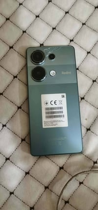 ريدمي نوت ١٣ برو • ٥١٢ • ظهر مكسور