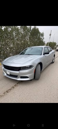 للبيع فقط  جارجر موديل 2023 sxt وارد امريكي  دفع ثنائي ماشيه 20 الف مي...