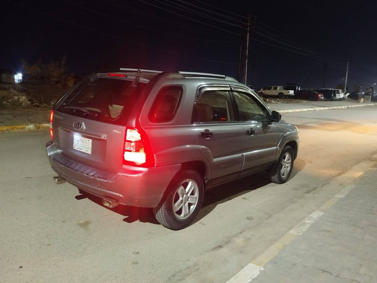 السلام عليكم سبورتج 2009  رقم بغداد كفالة السونار مرفق بالمنشور السعر 120 مكان  السيارة كوت ***********
