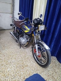 دراجه موديل 24  سونيك متواجد بس سيم كارت 07705284453 عنواني بغداد الزع...