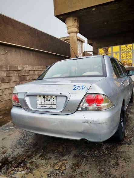 لانسر موديل 2010 خليجي بيهة  باب السائق ولباب خلف السائق مصبوغات كلير وخشم الجاملغ الخلفي طخة بسيطة عالبارد  شرط بدون  معجون و الباقي كفالة عامة شرط السونار مكينة 2000 شادهة جديد مال حاوية گير مكفول تبريد ثلج تخم تاير جديد صدر جديد السيارة ماا ناقصهة اي شي گبل للشارع ماتصرف عليهة ربع ترايك للبصرة 
معروضة ب 85 وبيهة مجال 
مكان السيارة بغداد. تقاطع النهروان مكلف بالنشر للاستفسار 
***********
