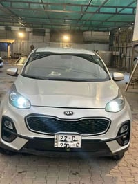 كيا سبورتج ( موديل 2022 ) لون سلفر وارد امريكي ضرر جدًا بسيط واضح بل م...