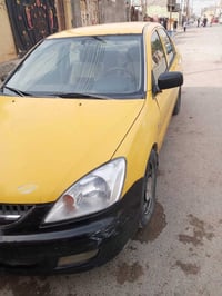 لانسر موديل 2007رقم ميسان  بسمي كير اوتماتيك تخم تاير جديد صدر نضيف سي...