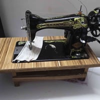 مكينة خياطة • أم البنت • شغالة