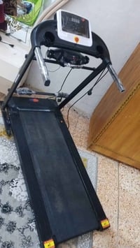 جهاز جري • نظيف • استعمال قليل