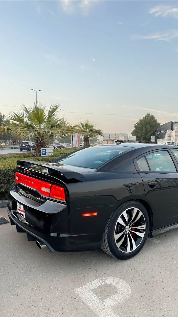 سلام عليكم 
دودج جارجر 2012 SRT اصل محرك 8 سلندر 6400 وارد امريكي ماشيه 83 ميل مواصفات السياره داخل احمر مختوم SRT بلادي دركة ستيرن SRT هم بلاد كير 6 نمر عصا سستم صوت هارمن كاردن كرسي خزن ميموري ستيرن كهرباء خزن مري قلاب كهرباء كراسي تدفئه تبريد كلاصات تدفئه تبريد ستيرن تدفئه كراسي خلفي تدفئه دوسات سكليتر بانزين وبريك كهرباء خزن مازدات حديثه عدسة قويه ولدات الوان متغير تخم وياله مختوم SRT اصلي فجوج برمبو اكسل قفل SRT بلادي كزوز دبات سود SRT بلادي السياره فول مواصفات بس بدون فتحه حادثها تبديل قطعتين نفس اللون وبالعراق 3 قطع صبغ (بدون ايرباك) بدون دواخل رقم بغداد جديد هزه جديده وسنويه لل2030 مكتوب بالسنويه محرك 6400 باسمي تحويل اي وقت 
السعر 147$ ورقه وبيها مجال 
مكان السياره بغداد الاعظميه 
الرقم *********** بغداد, العراق
