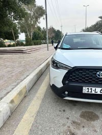 كورلا كروس هايبرد 2024 شركة ساز SAS (مو صيني) رقم بغداد بأسمي ماشية 36...