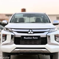 يتوفر غراض بيكب ميتسوبيشي L200 بغداد السنك مجمع مينا الفرع الاول بغداد...