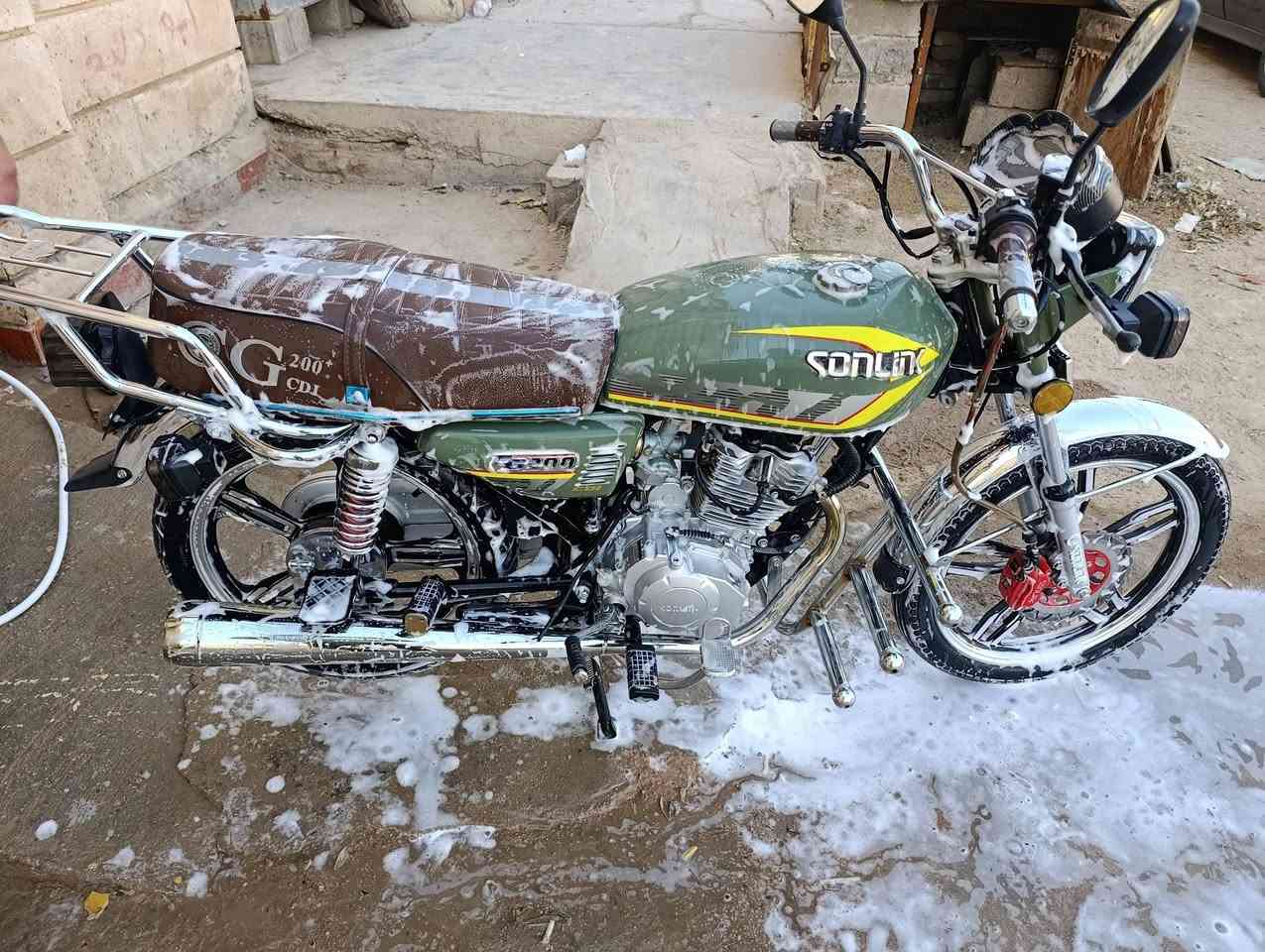 بسم الله الرحمن الرحيم..موطور ايراني موديل 24نضافه فول مكفول من كلشي محرك كفاله عامه دراجه كلش راقيه السعر 750بي مجال شي بسيط مكاني الرمادي 7كيلو ..***********
