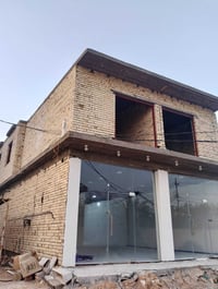 كربلاء الحر اليسار • بناية تجارية • محلات ٢