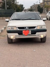 بيجو اكد • ٢٠١٣ • رقم بغداد