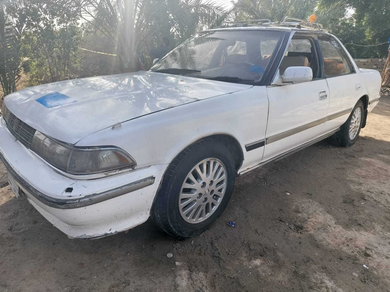 س. ع سياره مارك مسطره للبيع او مراوس  سياره جاهزه وحلوه حداديه جديده كير توني شاده مكينه ٢٥٠٠ دواخل جدد ويل ملكه كرستال تخم تاير جديد رقم نجف الماني راعيه موجود بل ناصريه  اكفله الك كص ونقل وتحويل السعر (32)وبيه مجال *********** مكاني ناصريه سوق الشيوخ
