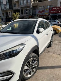 توسان ٢٠١٨ • محرك ٢٠٠٠ دوش • ١١٧ ألف كم