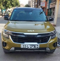 kia seltos sx 2024 وارد امريكي توكلر لون مميز  رقم  بغداد  بدون صبغ بد...