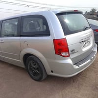 دوج كرفان موديل 2012 امريكي بدون حادث محرك كير تبريد تدفئه  دوشمة جلد ...