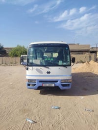 كوستر نيسان 2002 محور كاز  السعر 115 رقم الموبيل  07724110007