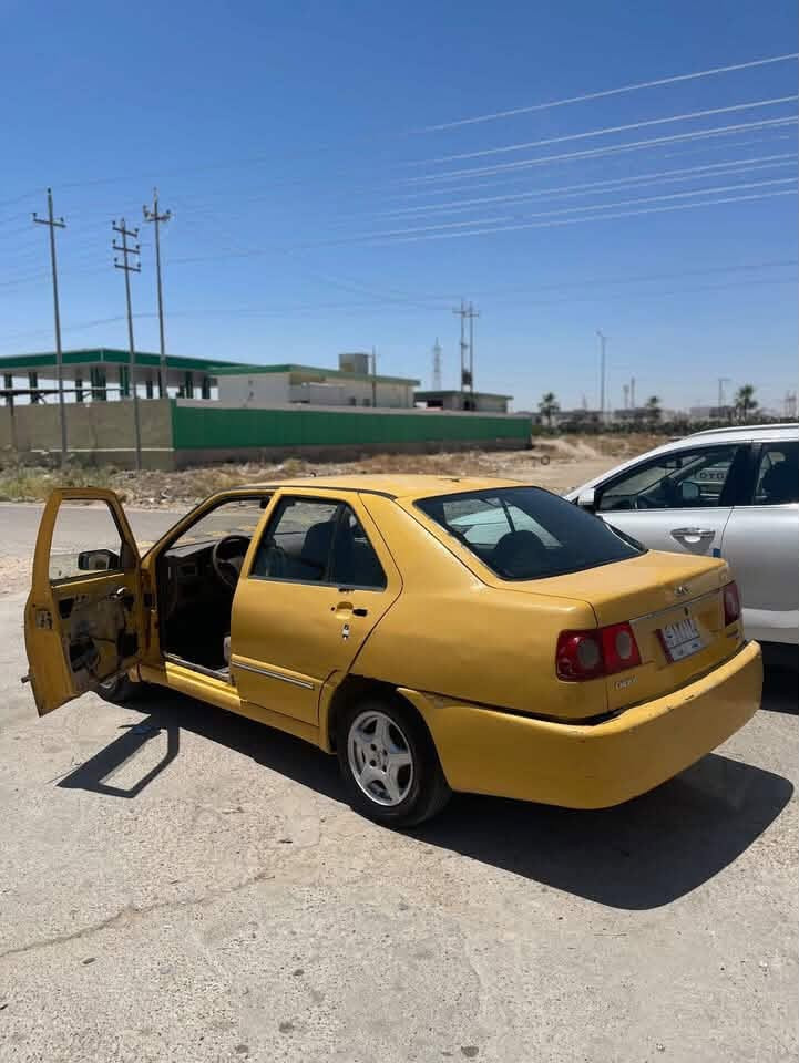 شيري صيني تكسي رقم بغداد الماني مشروع وطني كير ومحرك كورلا90 جاهزة من كلشي للبيع نقدا او بالاقساط سعر النقد25  ورقة والاقساط مقدمة10 وبالشهر ورقتين ب30التواصل عالرقم***********/تكريت القادسية شارع الگراج
