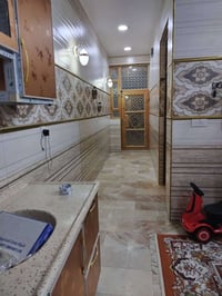 حي الحسين بغداد • بيت ١٥٠م • ٤ غرف نوم