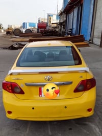 للبيع كورلا موديل 2010 رقم بغداد  امريكي الحادث باب السائق و نصف الدوس...