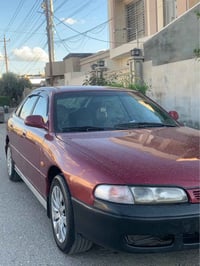 مازدا فاصوليا • ١٩٩٤ • بطاقة بنزين