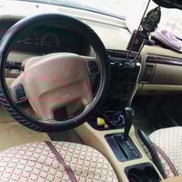 جيب شيروكي مديل ٢٠٠٠ مكينه ٦ سلندر تو ويل رقم بغداد السعر ٥٥ وبيه مجال...