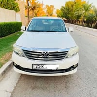 عندي تيوتا فورتشنر مديل 2014  مكفوله كفاله عامه ماعدا الجاملخ الامامي ...