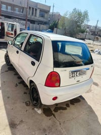 كيوكيو  موديل ٢٠١٣ كير عادي  للبيع سعر 26$  سيارة نضيفه وجاهزة المكان ...