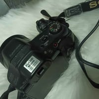كاميرا HX200V • زووم ٢٧-٨١٠مم • ١٨.٢ ميجابكسل