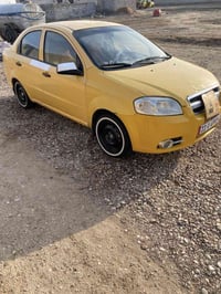 أفيو ٢٠١٠ • تكسي اصفر • رقم بغداد