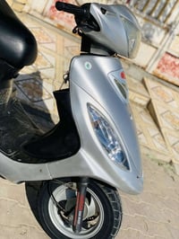 كامكو 125 سي سي • V2 • المجر الكبير