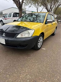 لانسر • ٢٠١٠ • اوتوماتيك