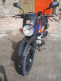 دراجه بوكسر ٢٣ مرقم بغداد للبيع دراجه مبدل بيها كور وعليها غرامه ٤٠٠ ا...