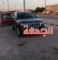 جيب شيروكي الون اسود كذاب رقم بغداد دولي بأسمي فول مواصفات واحد ع واحد...