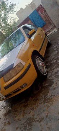 سمند مديل 2011 رقم بغداد نكليزي مصفره وكامله تحويل مباشر محرك وكير صدر...