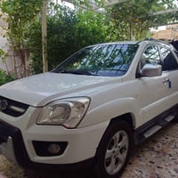 سبورتج 2010 خليجي ماشية 147,000 محرك 2000 بدون صبغ بدون تبديل السعر 12...