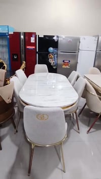 ميز طعام بيضوي • أبيض مذهب • ٦ كراسي