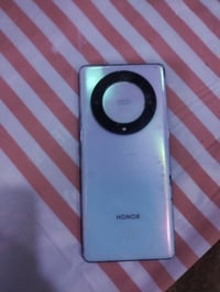 هونرx9a5G ذاكره128جهاز حلو شغال كلشي مابيه نضيف فقط بس كامره خلفيه مات...