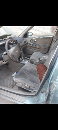 نيسان مكسيما 2003سنويه بأسمي كير ومحرك جدد مال حاوية تعرضت الحادث ابيع...