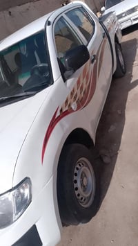 ميتسوبيشي • ٢٠١٢ • ضربة خلفية