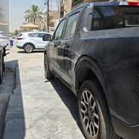 الســلام عليــكم -   فورد مافريك - موديل .2023 - ضرر .    الباب الخلفي...