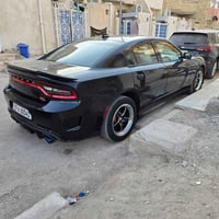 دوج جارجر 2016 اصل لون اسود للبيع السياره كامله مكمله من تبريد وحداديه...