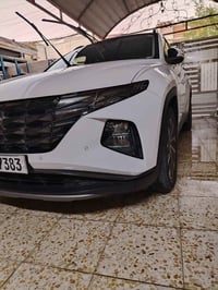 توكسان  2024  خليجي محرك 2000  فول مواصفات بانوراما  لون ابيض  رقم بغد...