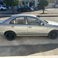 نيسان سني ٢٠٠٨ لون رصاصي سعر٨١ للاتصال 07802236432