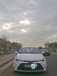 للبيع  كورلا 2025 هايبرد ليفين HEV ماشية 13 الف كيلو متر رقم بغداد الج...